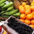 Pueden participar imágenes de ferias y mercados populares en Latinoamérica, reflejos de una economía informal.